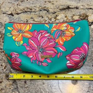 Trina by Trina Turk Teal Bag with Pink and Orange Floral Design.